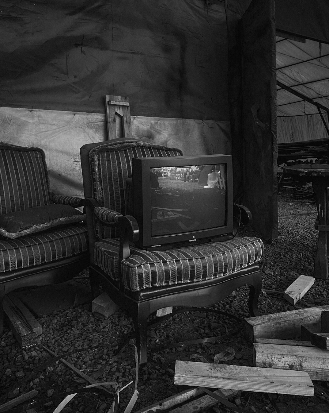 Rows of empty seats in a vintage television studio audience