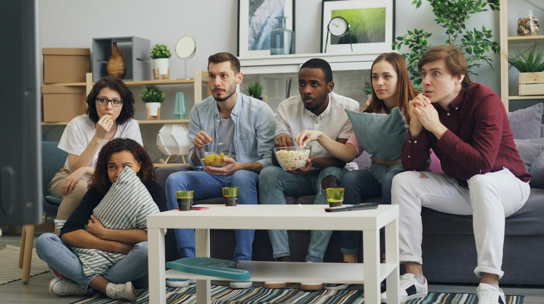 group of friends watching tv